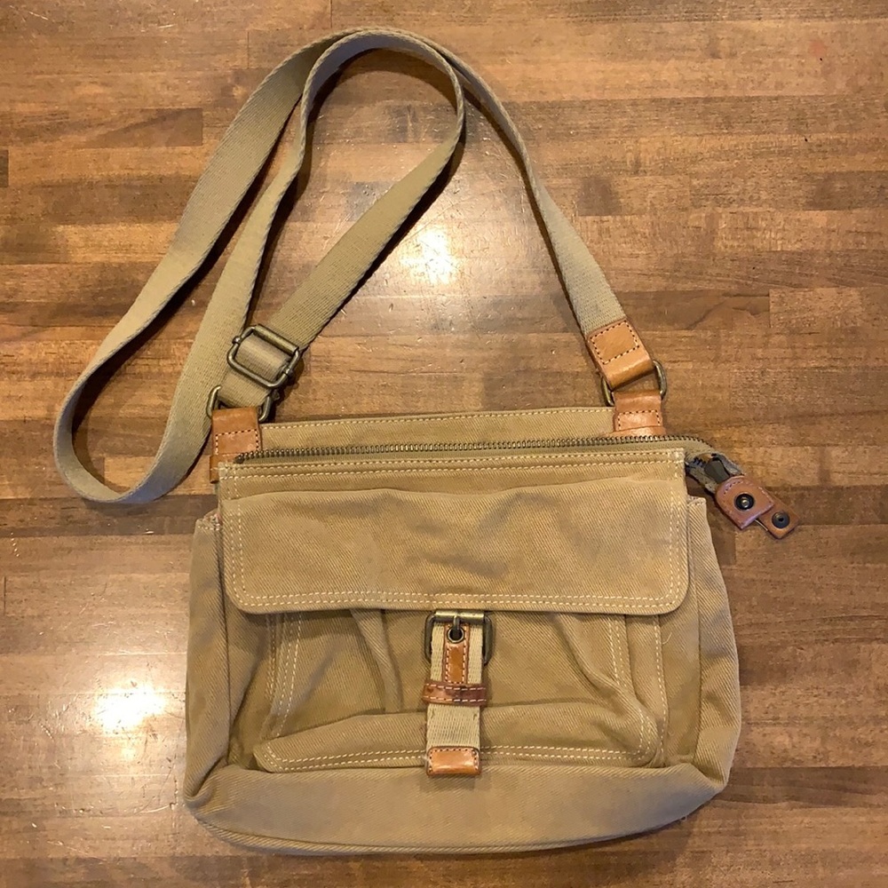 Fossil crossbody bag microfiber/corduroy with boho style stripes inside.